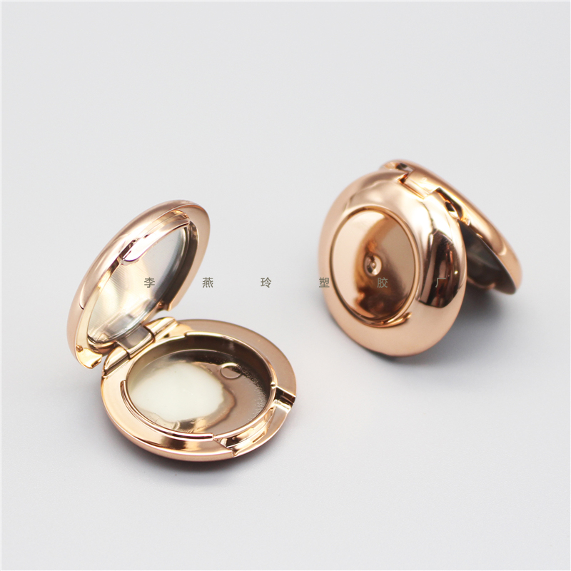 Round gold mirrored eye shadow box